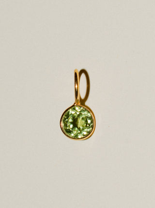 Pleasing Peridot Round Cut Charm in Yellow 14k Gold