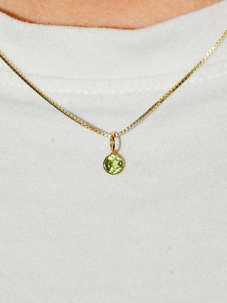Pleasing Peridot Round Cut Charm in Yellow 14k Gold