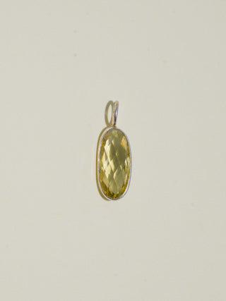 a little wedge Lemon Quartz Rose Oval Cut Charm in Sterling Silver