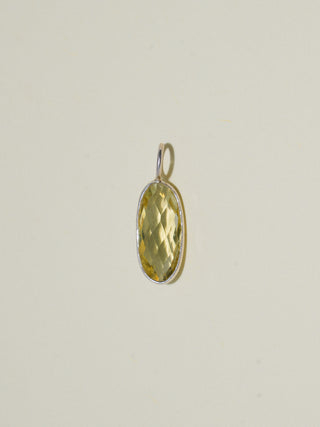 a little wedge Lemon Quartz Rose Oval Cut Charm in Sterling Silver