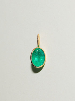 Get the Horns Emerald Oval Cut Charm in Yellow 14k Gold