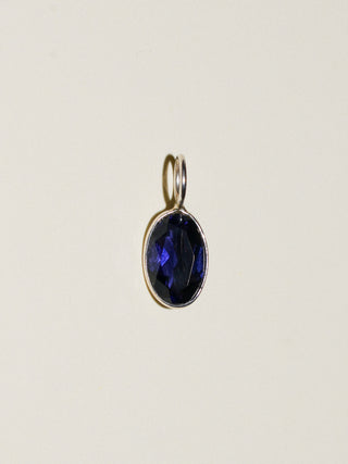 Fluttering Iolite Oval Cut Charm in Sterling Silver