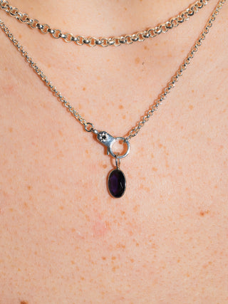 Fluttering Iolite Oval Cut Charm in Sterling Silver