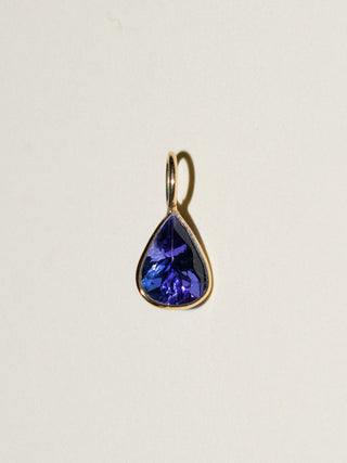 Strong Indigo Tanzanite Pear Cut Charm in Yellow 14k Gold