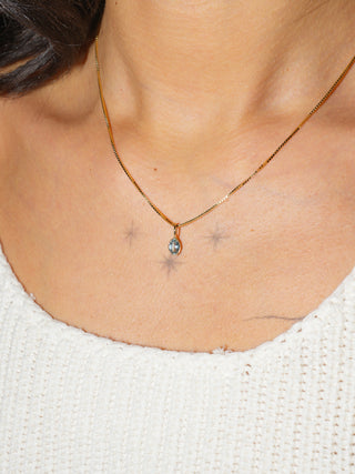 Tranquil Blue Aquamarine Oval Cut Charm in Yellow 14k Gold