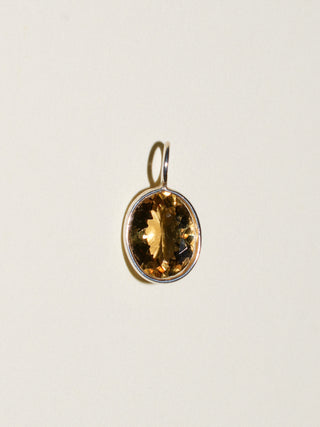 Pale Fire Yellow Beryl Oval Cut Charm in Sterling Silver