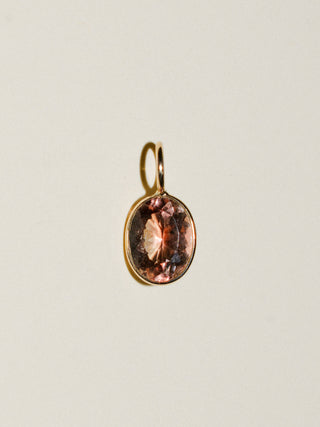 Peachy Sunstone Oval Cut Charm in 14k Yellow Gold