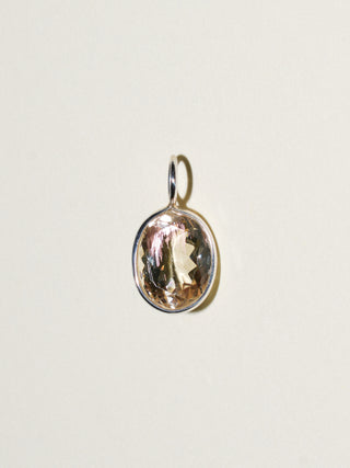 Sweet Cream Sunstone Oval Cut Charm in Sterling Silver