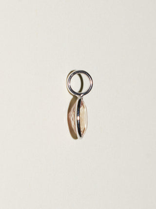 Subtle Peach Sunstone Oval Cut Charm in White 14k Gold
