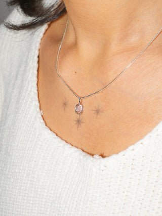 Subtle Peach Sunstone Oval Cut Charm in White 14k Gold