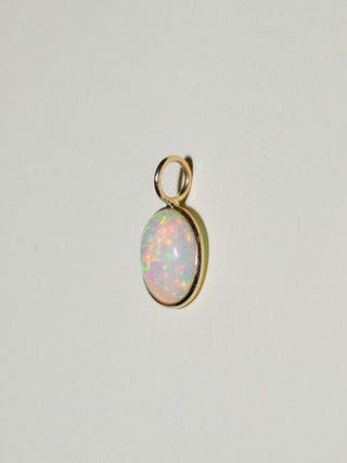 Fairy Dust Opal Oval Cabochon Charm in Yellow 14k Gold