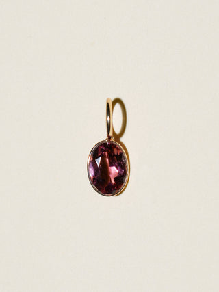 Sentimental Pink Tourmaline Oval Cut Charm in Yellow 14k Gold