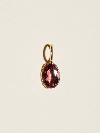 Sentimental Pink Tourmaline Oval Cut Charm in Yellow 14k Gold