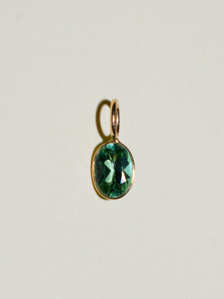 Discus Tourmaline Oval Cut Charm in Yellow 14k Gold
