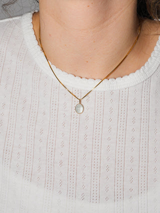 Patterns Blue Aquamarine Oval Cabochon Charm in Yellow 14k Gold