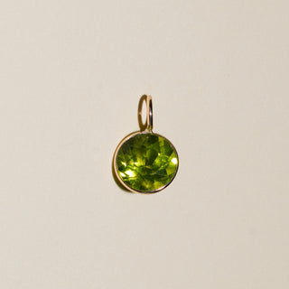 Green Tea Peridot Round Cut Charm in Yellow 14k Gold