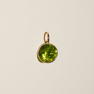 Green Tea Peridot Round Cut Charm in Yellow 14k Gold