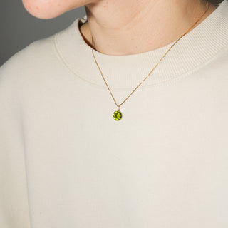 Green Tea Peridot Round Cut Charm in Yellow 14k Gold