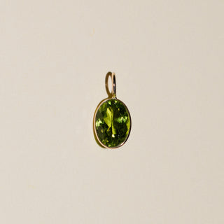 Green Glow Peridot Oval Cut Charm in Yellow 14k Gold