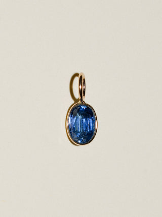Dazzling Kyanite Oval Cut Charm in 14k Yellow Gold