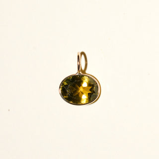 Golden Cypress Green Tourmaline East West Oval Cut Charm in Yellow 14k Gold