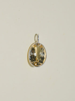 I Beach Heliodor Oval Cut Charm in Sterling Silver