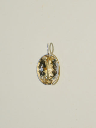 I Beach Heliodor Oval Cut Charm in Sterling Silver