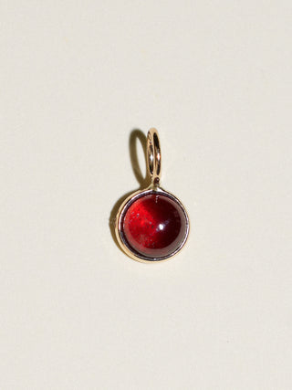 Grounding Garnet Round Cabochon Cut Charm in Yellow 14k Gold
