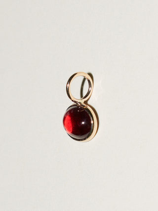 Passionate Garnet East West Oval Cabochon Charm in Yellow 14k Gold