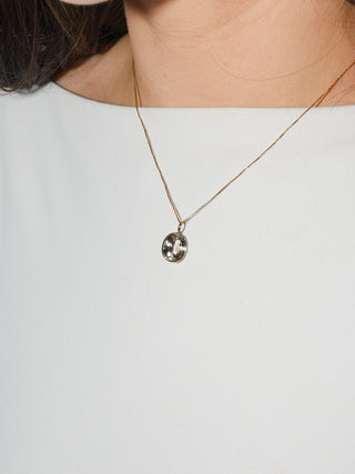 Glittering Imperial Topaz Oval Cut Charm in 14k Yellow Gold