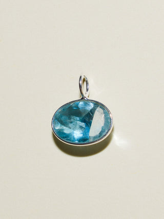 Swimmer Winner Fluorite East West Oval Cut Charm in Sterling Silver