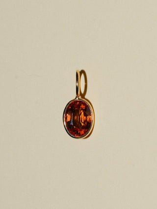 Golden Hour Orange Sapphire Oval Cut Charm in Yellow 14k Gold