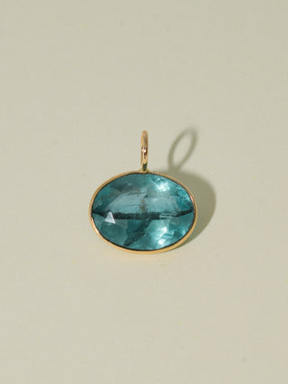 Cruising for a Fluorite East West Oval Cut Charm in Yellow 14k Gold
