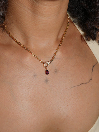 Witch Tights Comeria Garnet Teardrop Cut Charm in Yellow 14k Gold