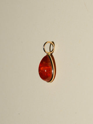 A Splash of Sun Orange Garnet Teardrop Cabochon Charm in Yellow 14k Gold