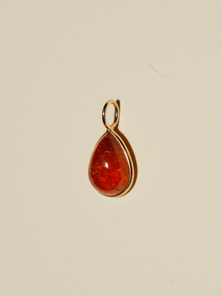 A Splash of Sun Orange Garnet Teardrop Cabochon Charm in Yellow 14k Gold