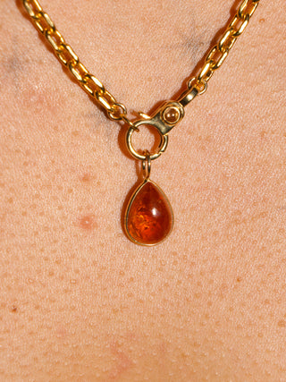 A Splash of Sun Orange Garnet Teardrop Cabochon Charm in Yellow 14k Gold
