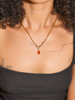 A Splash of Sun Orange Garnet Teardrop Cabochon Charm in Yellow 14k Gold