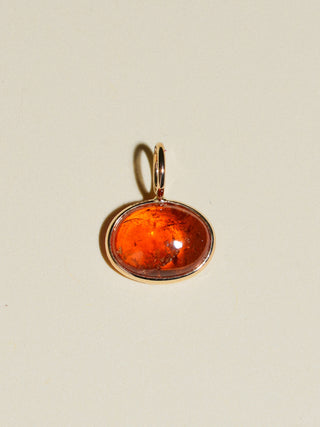 Greased Up Goddess Orange Garnet East to West Oval Cabochon Charm in Yellow 14k Gold