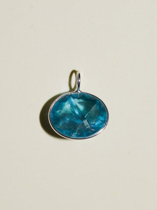 Chasing Light Fluorite East West Oval Cut Charm in Sterling Silver