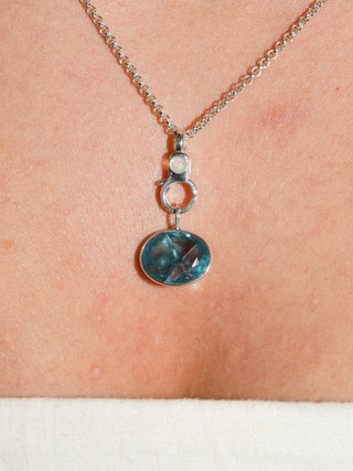 Chasing Light Fluorite East West Oval Cut Charm in Sterling Silver