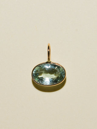 Clean Aquamarine East West Oval Cut Charm in Yellow 14k Gold
