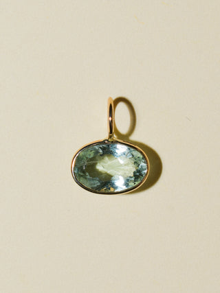 Clean Aquamarine East West Oval Cut Charm in Yellow 14k Gold