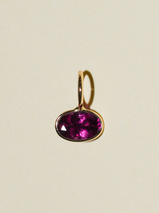 Trouble Rhodolite East West Oval Cut Charm in Yellow 14k Gold