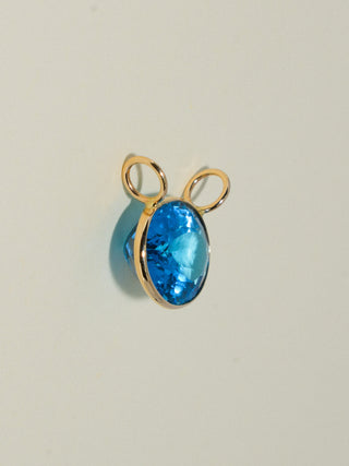 Royally Swiss Blue Topaz Gemela East West Oval Cut Charm in Yellow 14k Gold