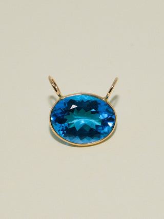Royally Swiss Blue Topaz Gemela East West Oval Cut Charm in Yellow 14k Gold