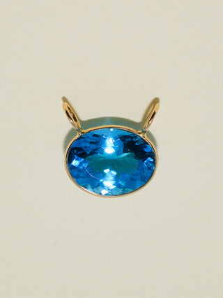 Royally Swiss Blue Topaz Gemela East West Oval Cut Charm in Yellow 14k Gold