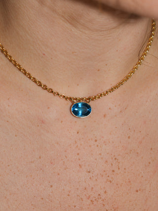 Royally Swiss Blue Topaz Gemela East West Oval Cut Charm in Yellow 14k Gold