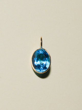 Sweetly Swiss Blue Topaz Oval Cut Charm in Yellow 14k Gold