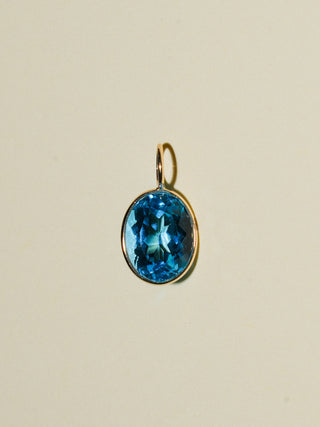 Sweetly Swiss Blue Topaz Oval Cut Charm in Yellow 14k Gold